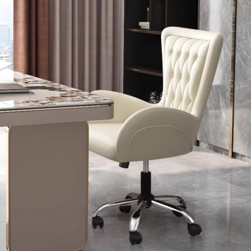 Work chair with leather seat and adjustable steel legs.